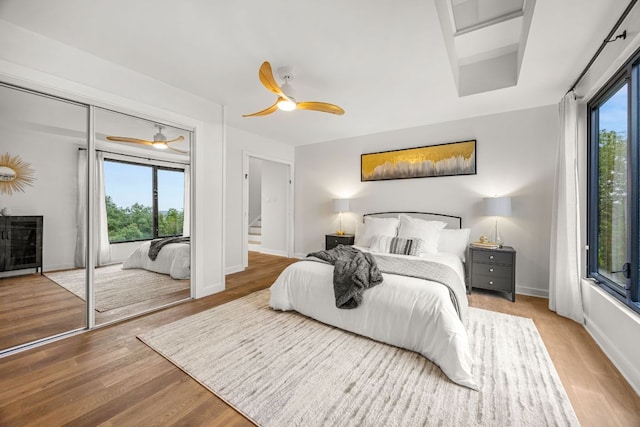 3704 Laurel Ledge Ln, Austin, TX 78731 - bedroom with wood finished floors and ceiling fan