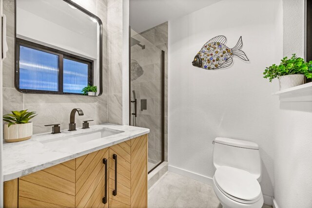 3704 Laurel Ledge Ln, Austin, TX 78731 - bathroom featuring vanity, a shower stall, and tile patterned floors