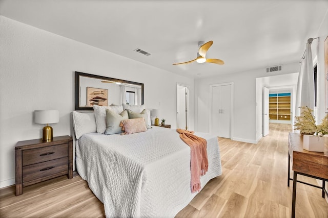 3704 Laurel Ledge Ln, Austin, TX 78731 - bedroom featuring light wood finished floors and a ceiling fan