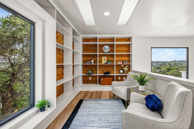 3704 Laurel Ledge Ln, Austin, TX 78731 - living area featuring wood finished floors and recessed lighting