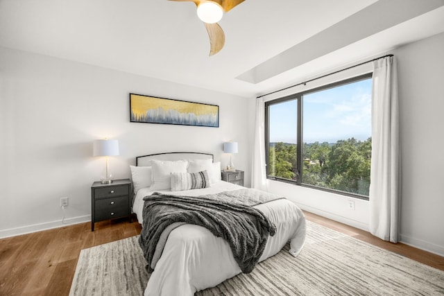 3704 Laurel Ledge Ln, Austin, TX 78731 - bedroom featuring wood finished floors and ceiling fan