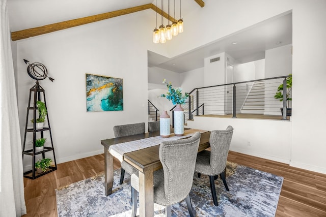 3704 Laurel Ledge Ln, Austin, TX 78731 - dining room featuring stairway and wood finished floors