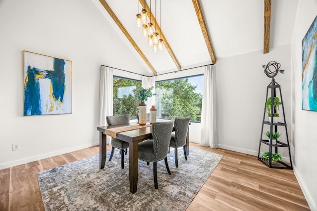 3704 Laurel Ledge Ln, Austin, TX 78731 - dining room featuring beamed ceiling, high vaulted ceiling, wood finished floors, and a chandelier