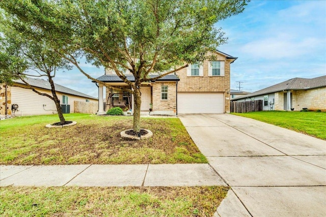 217 Adriana Ln, Hutto, TX 78634 - view of front of house featuring driveway and an attached garage