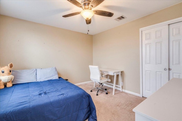 217 Adriana Ln, Hutto, TX 78634 - bedroom featuring carpet floors, ceiling fan, and a closet