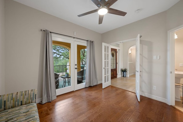 5715 Misty Hill Cv, Austin, TX 78759 - unfurnished bedroom with french doors, access to exterior, and wood finished floors