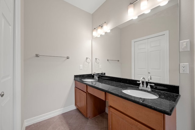 5715 Misty Hill Cv, Austin, TX 78759 - full bathroom featuring double vanity and tile patterned floors