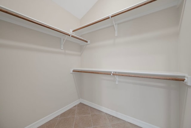 5715 Misty Hill Cv, Austin, TX 78759 - walk in closet with light tile patterned floors