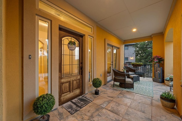 5715 Misty Hill Cv, Austin, TX 78759 - view of exterior entry featuring a porch and stucco siding