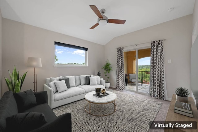 5715 Misty Hill Cv, Austin, TX 78759 - living room with lofted ceiling, ceiling fan, and light carpet