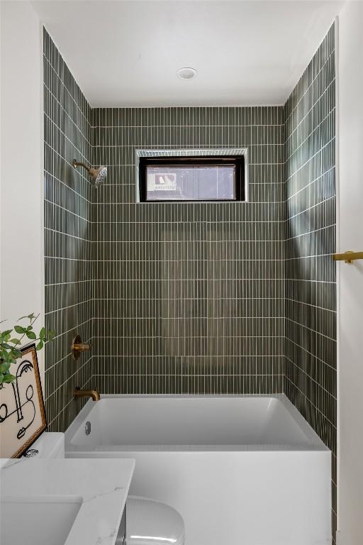 505 Philco Dr Unit 3, Austin, TX 78745 - full bathroom featuring washtub / shower combination and vanity