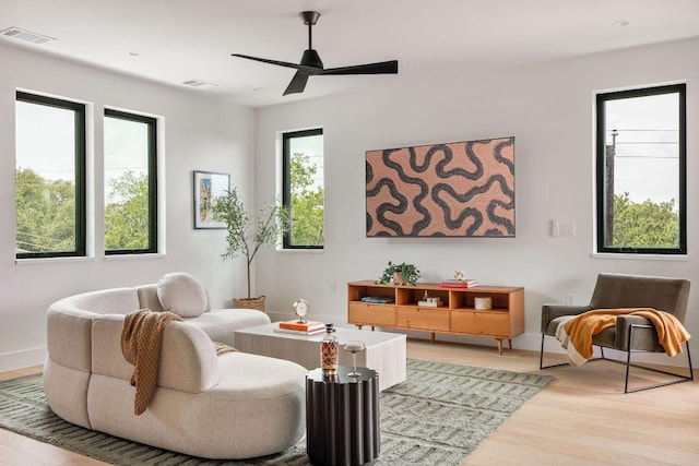 505 Philco Dr Unit 3, Austin, TX 78745 - living area featuring light wood-style flooring and ceiling fan