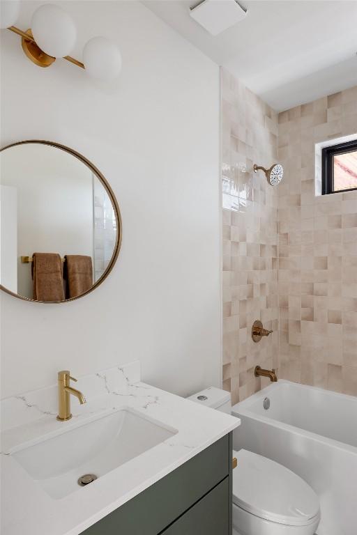 505 Philco Dr Unit 3, Austin, TX 78745 - bathroom with vanity and bathing tub / shower combination