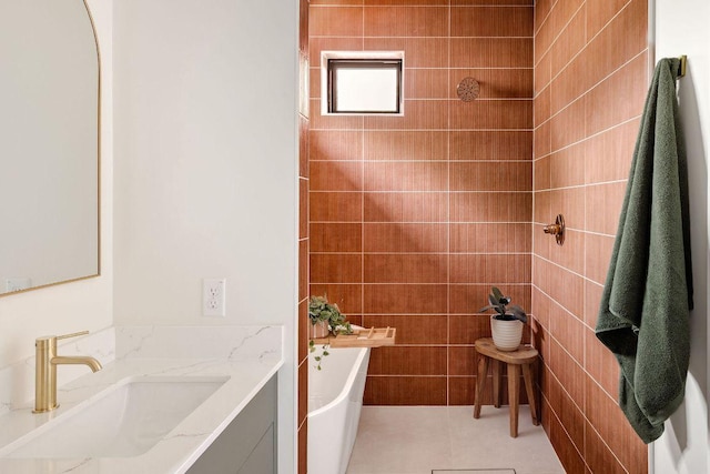 505 Philco Dr Unit 3, Austin, TX 78745 - bathroom with vanity, a tub to relax in, tile patterned flooring, and a shower