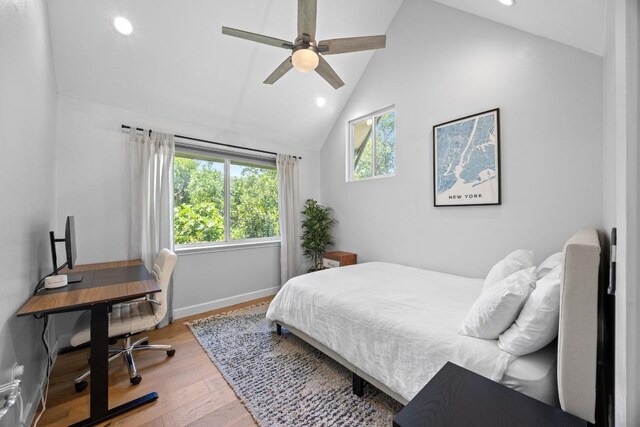 4602 Alf Ave Unit B, Austin, TX 78721 - bedroom with recessed lighting, wood finished floors, a desk, a ceiling fan, and high vaulted ceiling