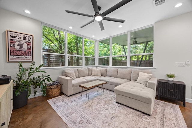 4602 Alf Ave Unit B, Austin, TX 78721 - living room with ceiling fan, plenty of natural light, recessed lighting, and finished concrete floors