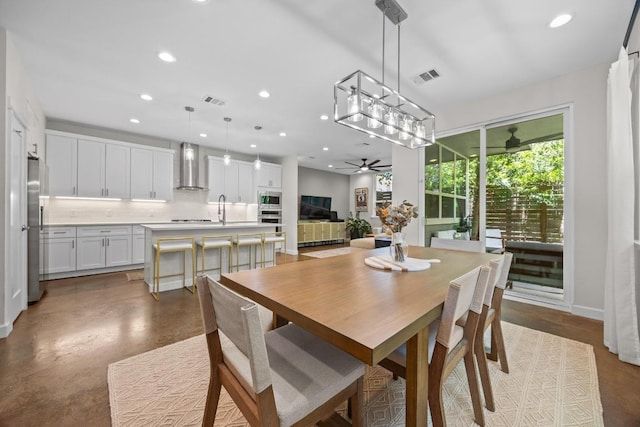 4602 Alf Ave Unit B, Austin, TX 78721 - dining room featuring ceiling fan, recessed lighting, and concrete flooring