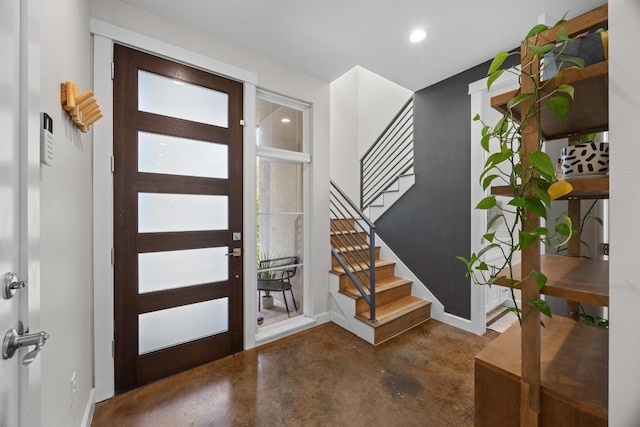 4602 Alf Ave Unit B, Austin, TX 78721 - entrance foyer with finished concrete floors, stairs, and recessed lighting