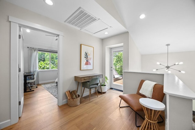 4602 Alf Ave Unit B, Austin, TX 78721 - living area featuring light wood-type flooring, recessed lighting, attic access, a chandelier, and lofted ceiling