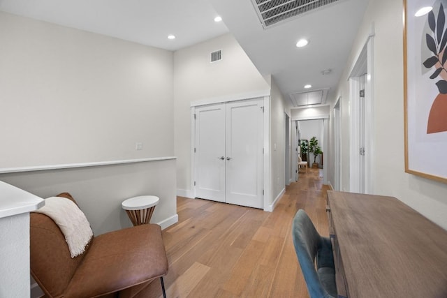 4602 Alf Ave Unit B, Austin, TX 78721 - living area with light wood-style flooring, attic access, and recessed lighting
