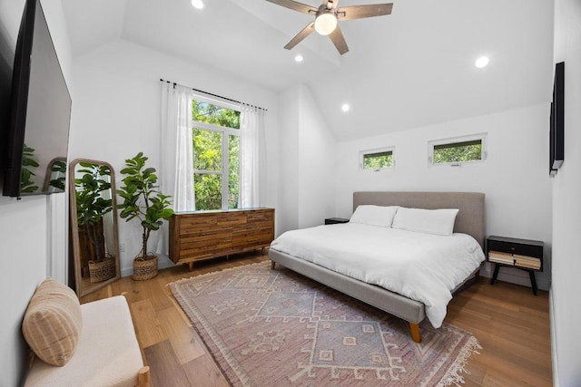 4602 Alf Ave Unit B, Austin, TX 78721 - bedroom with lofted ceiling, wood finished floors, recessed lighting, and a ceiling fan