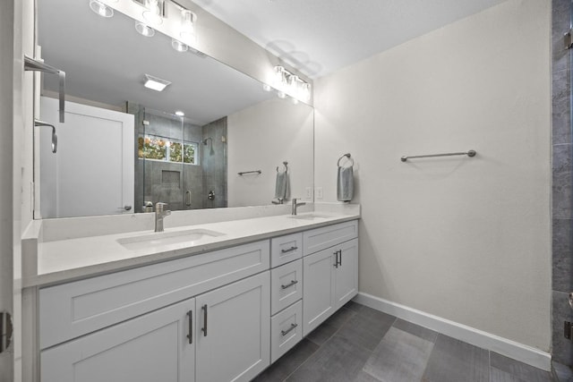 4602 Alf Ave Unit B, Austin, TX 78721 - full bath featuring double vanity, a stall shower, and tile patterned floors