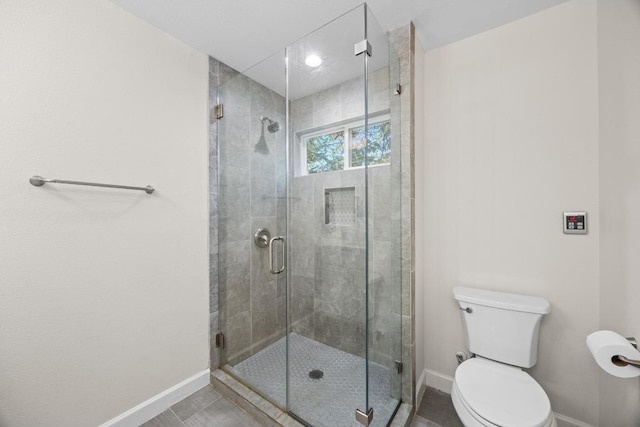 4602 Alf Ave Unit B, Austin, TX 78721 - full bathroom featuring baseboards and a stall shower