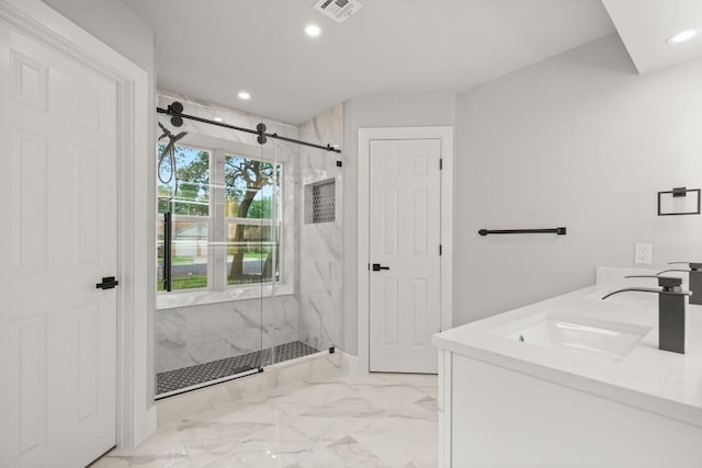 11462 Bristle Oak Trl, Austin, TX 78750 - full bathroom with a marble finish shower, marble finish flooring, recessed lighting, and double vanity