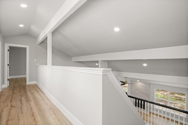11462 Bristle Oak Trl, Austin, TX 78750 - hall with lofted ceiling, recessed lighting, wood finished floors, and an upstairs landing