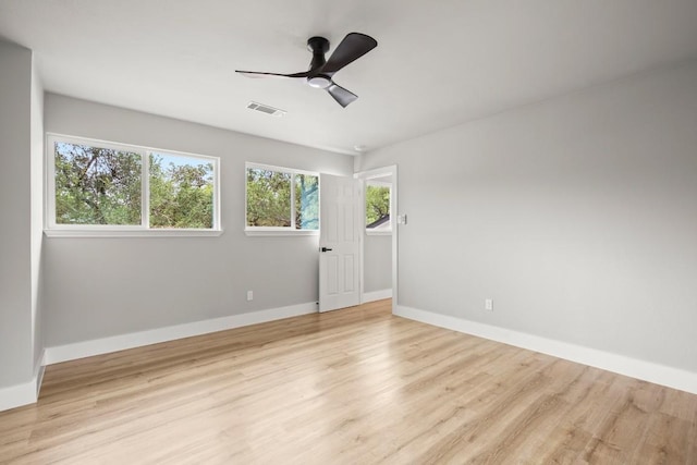 11462 Bristle Oak Trl, Austin, TX 78750 - empty room with light wood-style flooring and ceiling fan