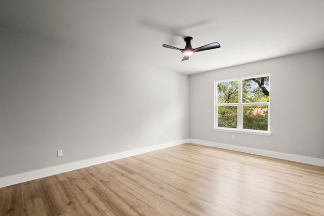 11462 Bristle Oak Trl, Austin, TX 78750 - spare room featuring wood finished floors and a ceiling fan