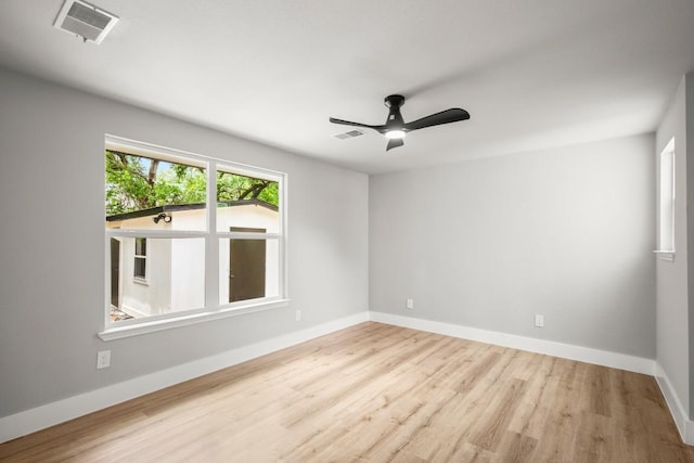11462 Bristle Oak Trl, Austin, TX 78750 - empty room with wood finished floors and a ceiling fan