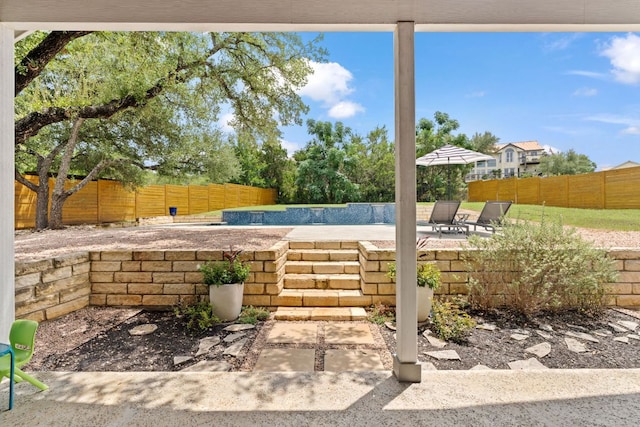503 Alva Dr, Spicewood, TX 78669 - fenced backyard with a patio