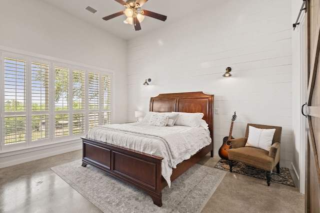 503 Alva Dr, Spicewood, TX 78669 - bedroom featuring concrete flooring, a high ceiling, and ceiling fan