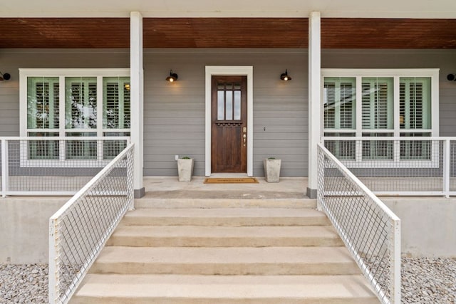 503 Alva Dr, Spicewood, TX 78669 - doorway to property with covered porch