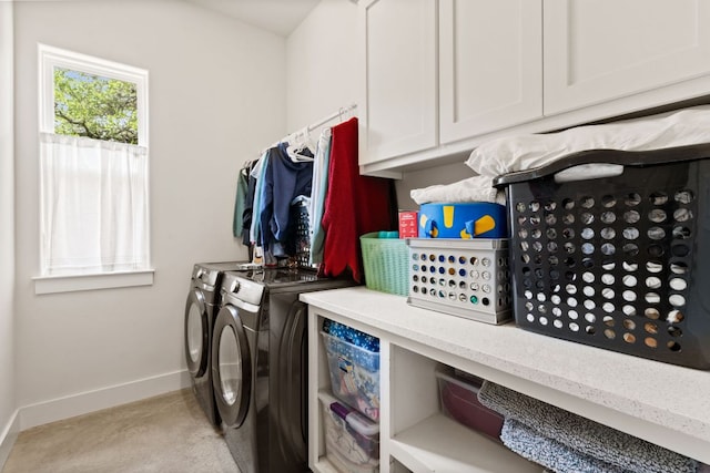 503 Alva Dr, Spicewood, TX 78669 - laundry area featuring separate washer and dryer and cabinet space
