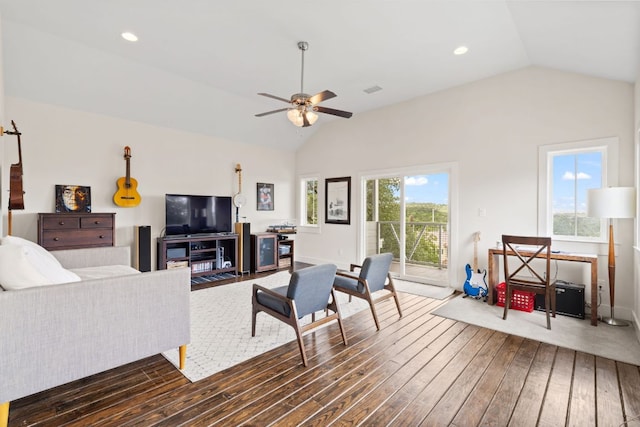 503 Alva Dr, Spicewood, TX 78669 - living area with vaulted ceiling, dark wood finished floors, and a ceiling fan