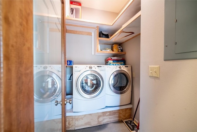 103 Rolling Hills Dr, Spicewood, TX 78669 - washroom featuring washing machine and clothes dryer and electric panel