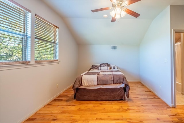 103 Rolling Hills Dr, Spicewood, TX 78669 - bedroom featuring wood finished floors, vaulted ceiling, and ceiling fan