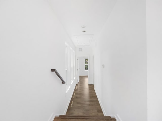 1605 Garden St, Austin, TX 78702 - staircase with attic access and wood finished floors