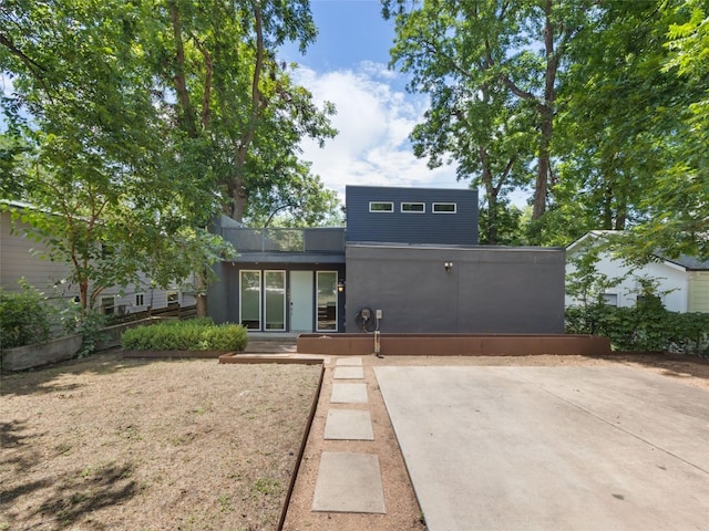 1605 Garden St, Austin, TX 78702 - view of front facade featuring stucco siding