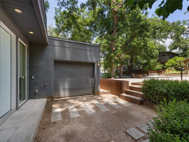 1605 Garden St, Austin, TX 78702 - view of patio with an attached garage