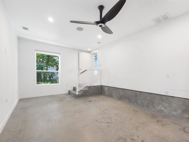 1605 Garden St, Austin, TX 78702 - unfurnished room with concrete floors, recessed lighting, ceiling fan, and stairway
