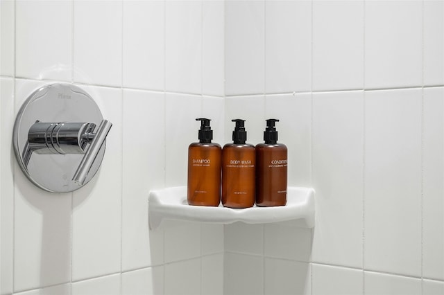 49 Navasota St Unit 216, Austin, TX 78702 - bathroom view of tile walls