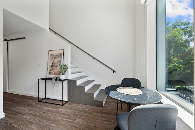 49 Navasota St Unit 216, Austin, TX 78702 - stairway featuring wood finished floors and a barn door