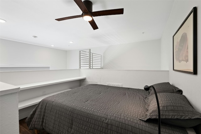49 Navasota St Unit 216, Austin, TX 78702 - bedroom with wood finished floors, ceiling fan, and recessed lighting
