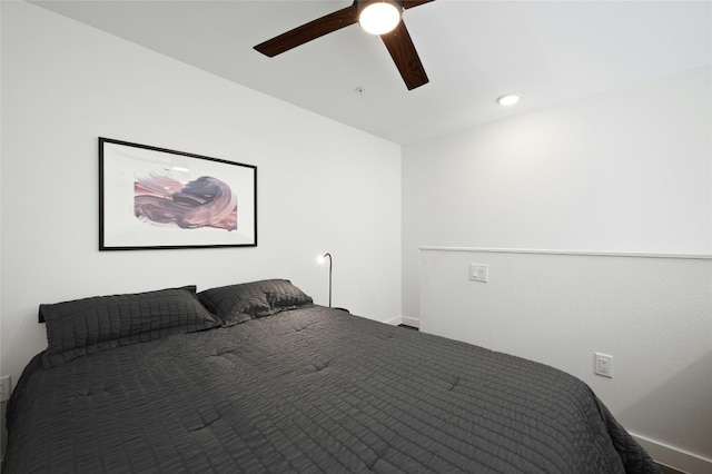 49 Navasota St Unit 216, Austin, TX 78702 - bedroom with a ceiling fan and recessed lighting