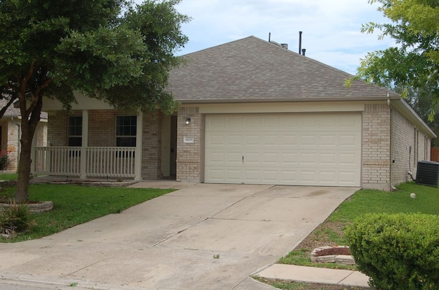 4216 Veiled Falls Dr, Pflugerville, TX 78660 - single story home featuring brick siding, covered porch, an attached garage, concrete driveway, and a shingled roof