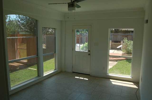 4216 Veiled Falls Dr, Pflugerville, TX 78660 - entryway featuring crown molding, ceiling fan, and tile patterned floors