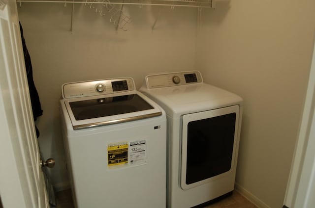 4216 Veiled Falls Dr, Pflugerville, TX 78660 - washroom with washing machine and clothes dryer